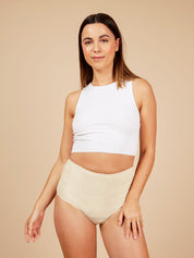 woman wearing beige seamless high waist period pants