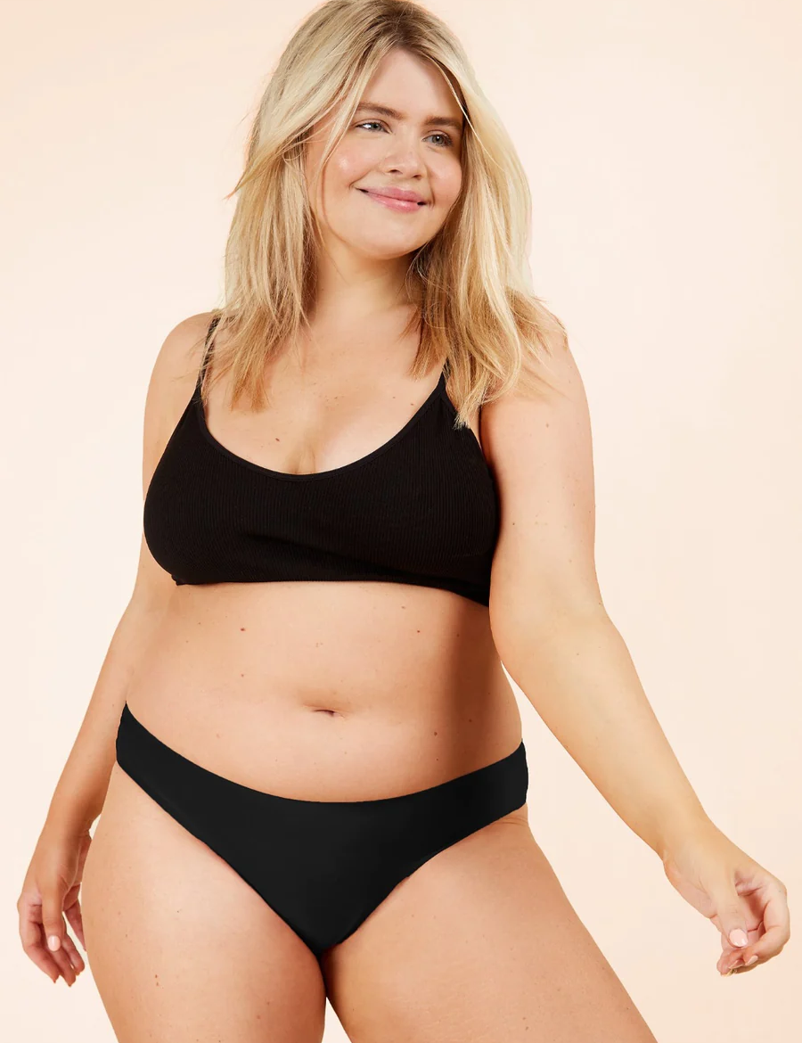 woman smiling wearing seamless period underwear